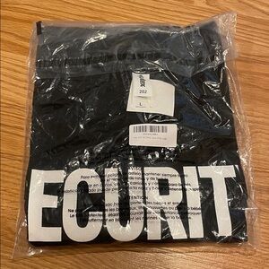 SECURITY black tee shirt Size L